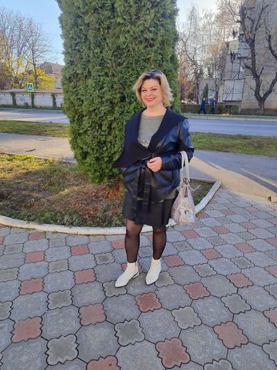  ,   Larisa, 51 ,   